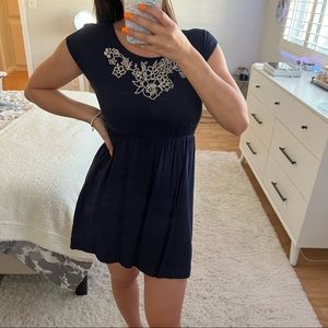 Blue summer dress with white embroidery